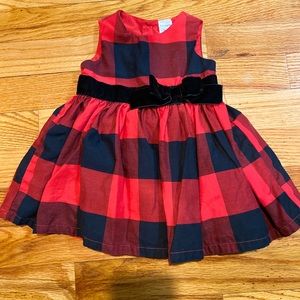 Baby girl’s red and black plaid dress